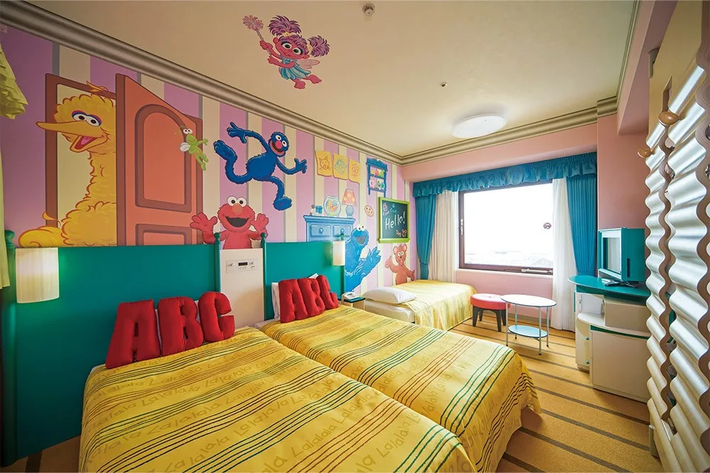 Overview of 7 different Sesame Street themed rooms featuring Elmo, Cookie Monster, and other characters at Kintetsu Universal City