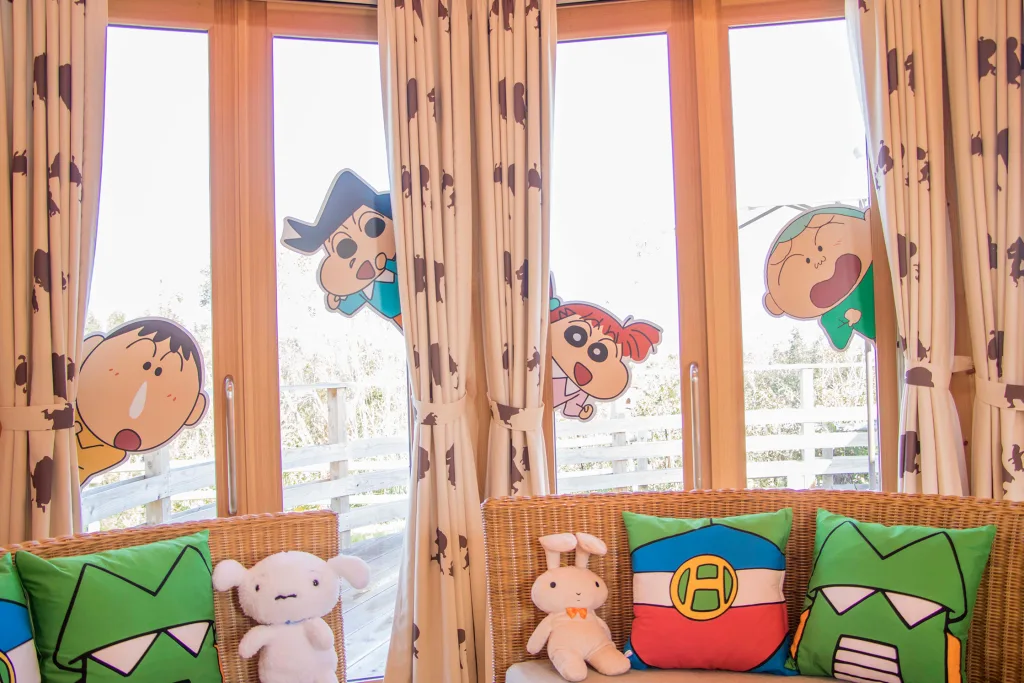 Crayon Shin-Chan themed hotel room with character artwork and playful designs at GRAND CHARIOT